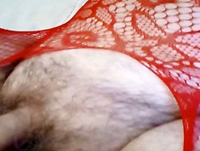 Lying Back Wanking In Fishnets With Dildo In
