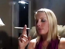 Hot Blonde Lady Lights A Cigarette And Smokes So Seductively