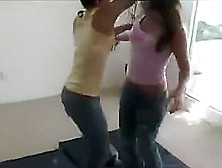 Two Girls Wrestling Barefoot In Jeans