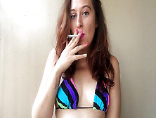 Jaw-Dropping Girl In Bikini Top Smoking White Filter 100 Cigarette In Pinkish Lipstick
