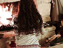 Setting Up The Fireplace: Curly Babe In A Winter Hoodie Warms Her Heart With Her Bare Hands