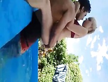 Lovers Having Sex In The Pool