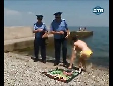 Russian Cops Harass Nude Sunbather