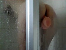 Peep Her Ride The Sticky Dildo In A Shower