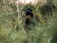 Brunette Spied Pissing In The Bushes