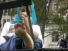 Arab Hijab Soles On A Bench