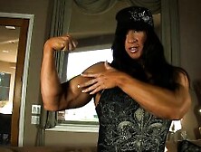 Beefy Milf Shows Us Her Muscles Then Her Big Clit