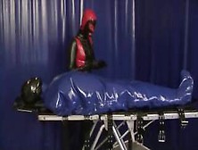 Latex Girl Heavy Rubber Slave In Inflatable Bondage Bag And Breath Control