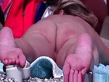 Nudist Woman Laid Down On Her Belly Sunbathing