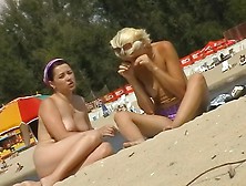 Guy Resting On Beach Spies Pretty Beach Nudist Girl