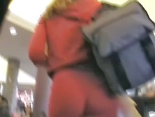Cute Blonde Woman Is Pink Dress Has A Very Cool Ass