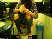Asian Teen Squatting On Toilet Pee Caught On Film
