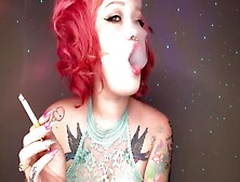 Ginger Tatted Lady Smoking