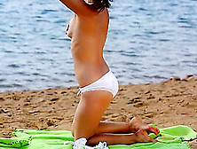 Audrey Gets Her White Panties Wet In The Ocean