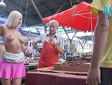 Hot Babe Flashes Her Tits At The Market