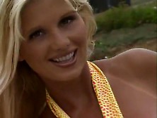 Big-Titted Milf Shows Her Goods In Softcore Porn Video