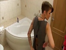 Tattooed Milf Fucking In Bathroom