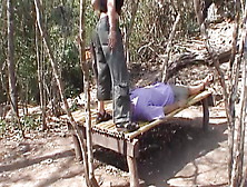 A Hot German Lady Gets Her Slave Punished Outdoors