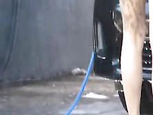 Sexy And Horny Brunette At The Car Wash