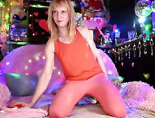 Trans-Girl Wetting Herself In Coral-Red Pants And Blouse.
