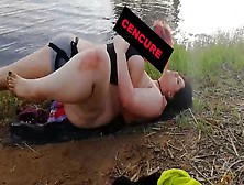 Fat Woman Gives A Girl With A Strapon By The River
