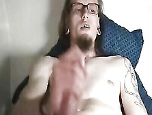 Nerdy Guy Grabs His Cock And Masturbates While Watching Gay Porn
