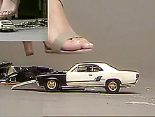 Alma Crushes A Model Car With Sexy Sandals