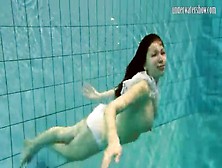Girl In White Panties Swims In Pool