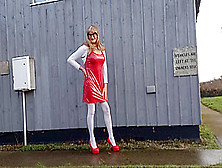 Tranny Outdoors Pissing In Red Pvc Dress