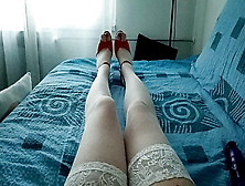 Milf Tranny Shows Off Only Her Legs In White Transparent Pantyhose Simulating Footjob With Vibrator