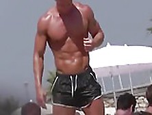 Muscle Hunk At The Beach