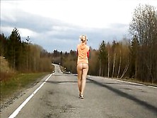 Older Out Of Pants Walking On The Road