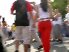 Sizzling Brunette Wearing Bright Red Pants Public Street Candid Vid