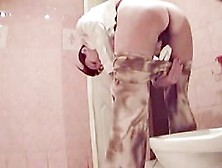Skinny Tanned Ass Caught On Spy Camera In A Bathroom