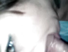 Amateur Girl Stares At The Camera While Having A Big Shaft In Her Mouth