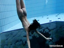 Naked Swimming Scene Starring A Busty Beauty