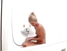 Sylvia In The Bath Shaving