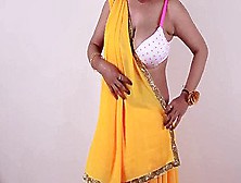 Hot Ladies Dressed In Sari & Displaying Her Large Boobs Cleavage
