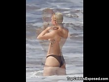 Miley Cyrus Shows Her Boobs In Hawaii!