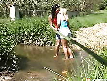 Blonde And Brunette Lesbians Fuck Outdoors