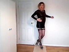 Black Stockings,  Leather Minidress And Heels