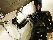 Sexy Black Rubberdoll In Bath