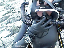 Dark-Hued Rubber Wetsuit Frogwoman With Twin Hose Total Face Mask