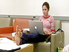 Dark Haired Barefoot Female Colleague Caught With Laptop During Lunch Break