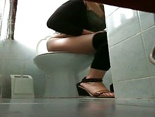 Toilet Blonde Girl Pissing Having No Clue To Be Spied
