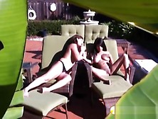 Two Horny Lesbos Rub Their Pussies Under The Sun