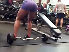 Woman In Tight Sports Shorts Exercising