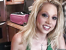 Fun Firecracker In A Green Top And Denim Shorts Preps Her Lingerie For A Shoot.