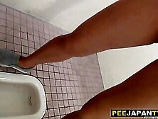 Asian Hottie Urinating While Watched