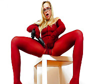 Blonde Wearing Glasses And Red Outfit Masturbates With Toy
